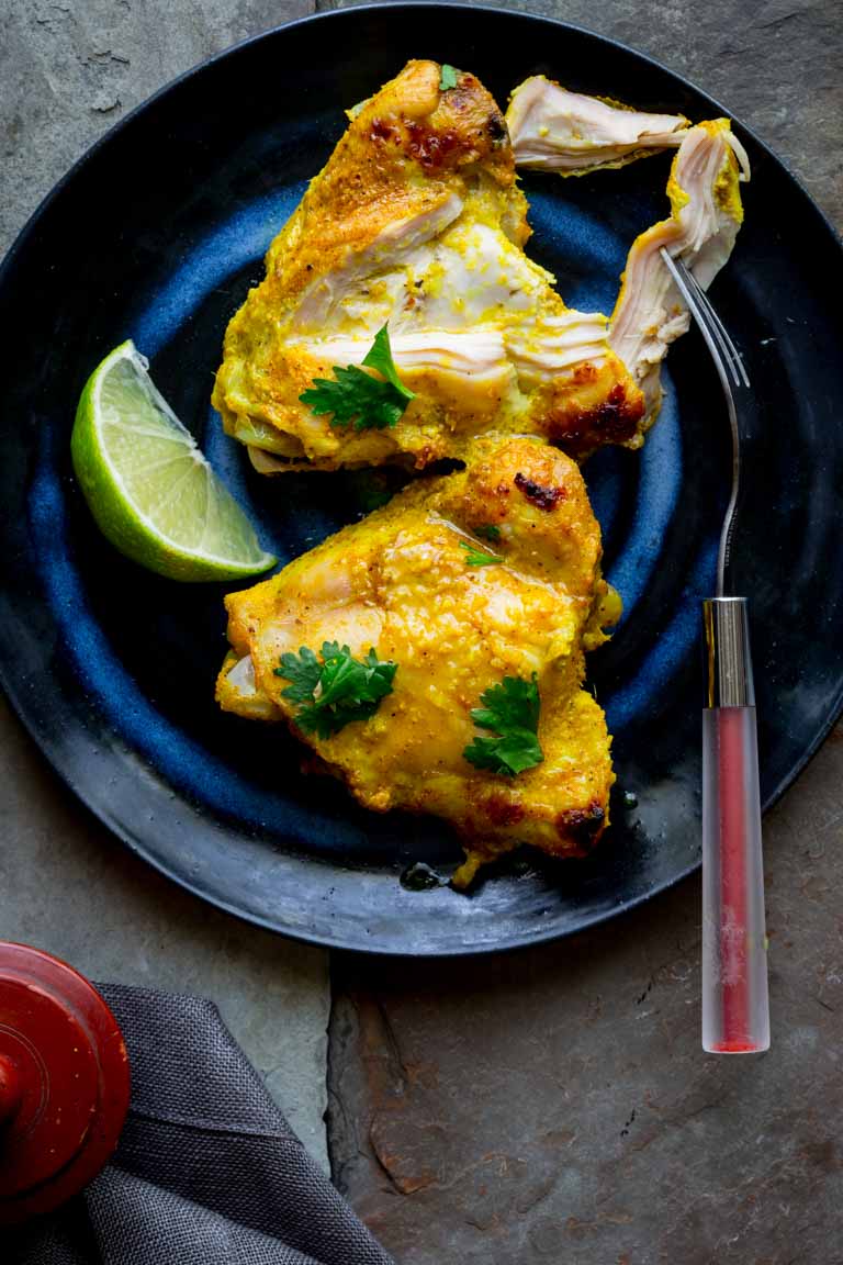 Yogurt Curry Chicken Thighs on a serving plate