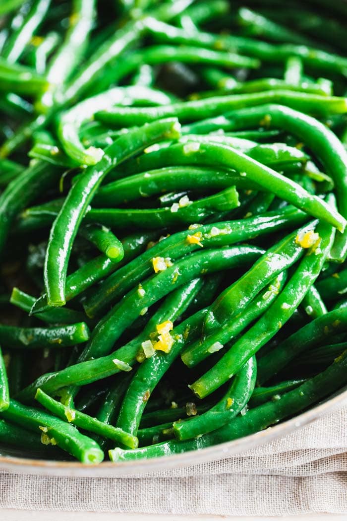 Citrus zest on green beans up close