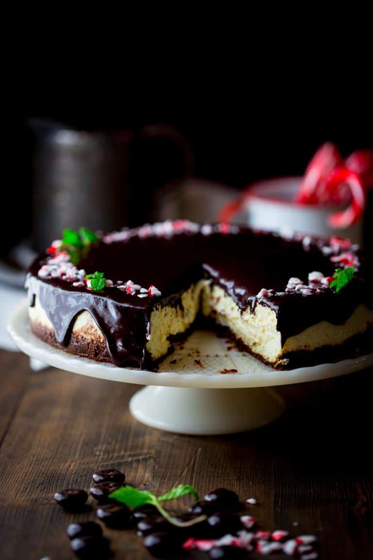 A Healthy Mint Cheesecake on a cake stand.
