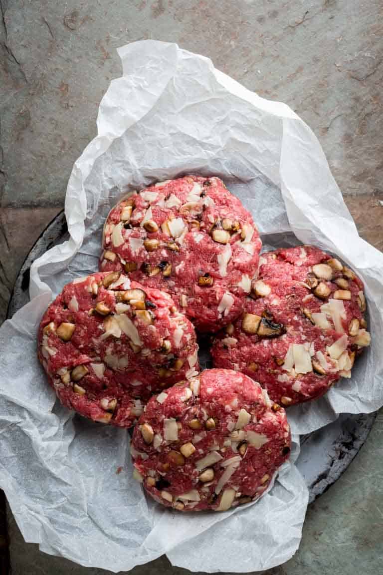 These Portobello and Swiss Beef Burgers are a healthier make-over of the all-American classic. And they’re ready in under 30 minutes, so you can get a delicious kid-friendly dinner on the table lickety-split! | Healthy Seasonal Recipes | Katie Webster