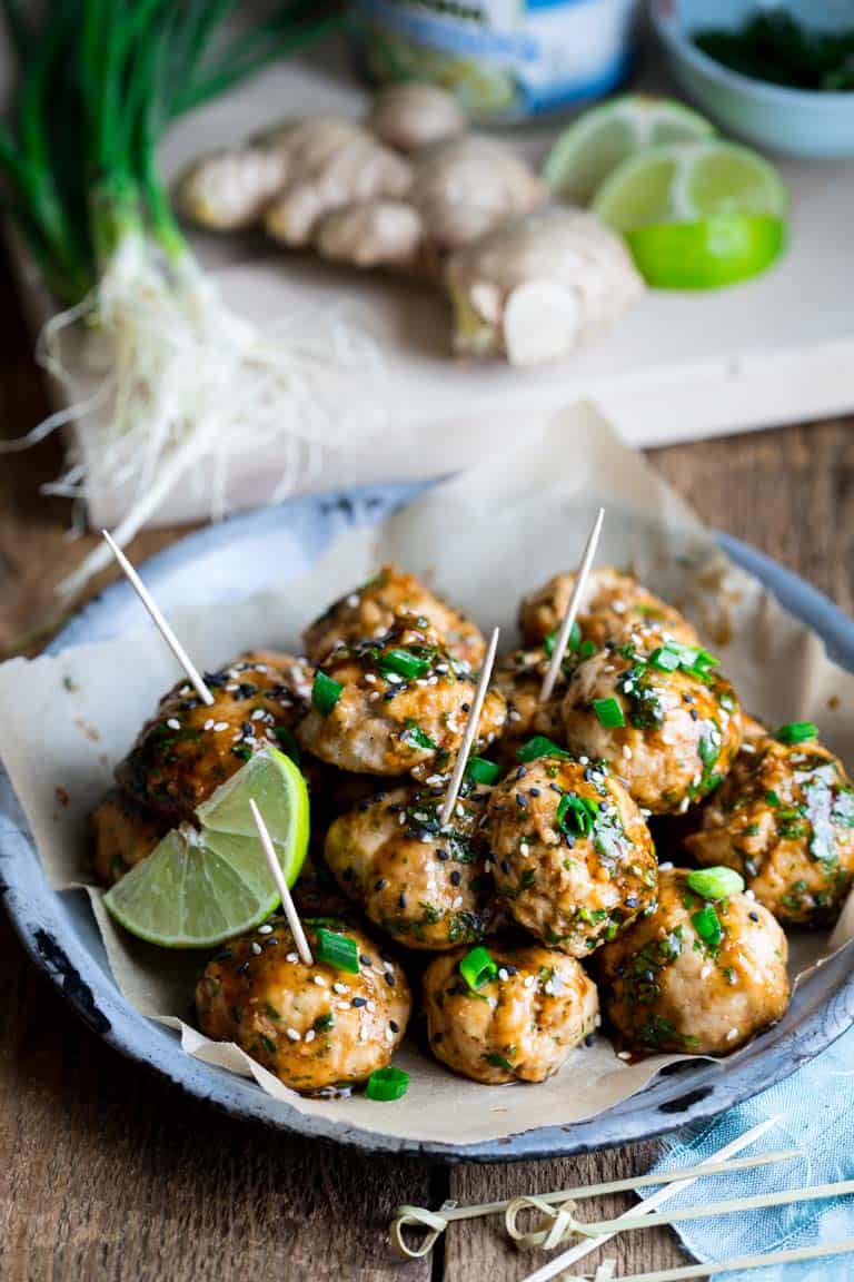 platter of meatballs with a lime wedge
