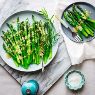 Put this Asparagus with Tarragon Vinaigrette on your Easter brunch menu and you will more time to spend with your guests and hide those eggs! This is the perfect make-ahead Spring side dish that is ready in under 30 minutes and just also happens to be vegetarian and Paleo friendly! Healthy Seasonal Recipes and Katie Webster