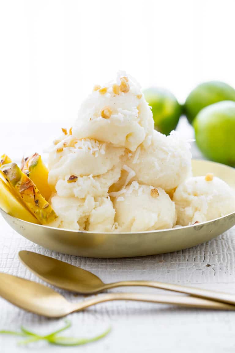 Just in time to help you survive this summer’s heatwave meet my refreshingly delicious Pineapple Coconut Sorbet. Super bonus that it is gluten free, and vegan!!