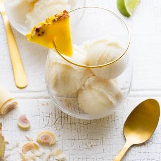 Just in time to help you survive this summer&rsquo;s heatwave meet my refreshingly delicious Pineapple Coconut Sorbet. Super bonus that it is #glutenfree, #lowfat, and #vegan too! | Healthy Seasonal Recipes