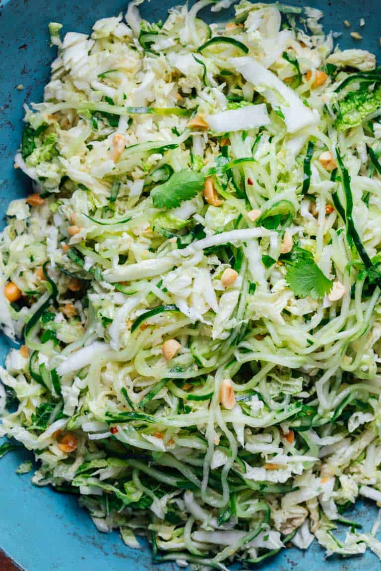 This Cucumber and Napa Cabbage Coleslaw is a yummy, refreshing, #vegan and #lowcarb recipe that will be the star of all your summer cook outs. And it's ready in just 20 minutes! | Healthy Seasonal Recipes #vegetarian #salad #glutenfree