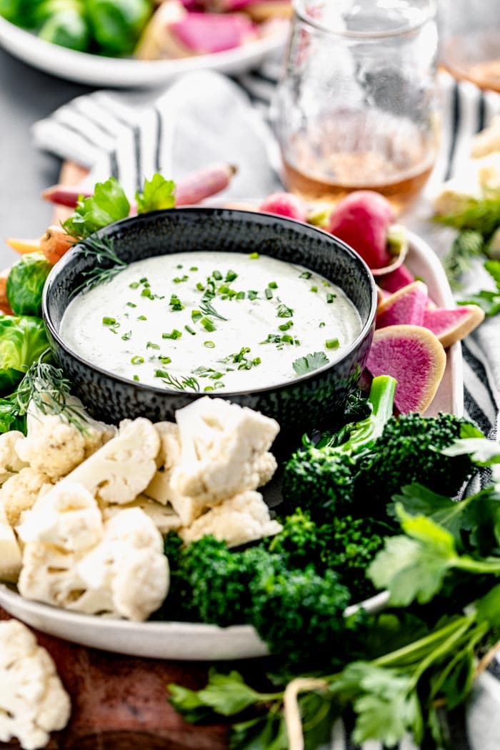 a platter of veggies and dip from the side