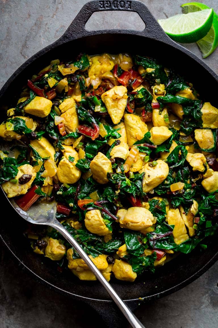 This Chicken and Chard with Curry is a One-Pot-Wonder! It's a super flavorful and healthy all-in-one dinner that just also happens to be gluten free, dairy free and paleo friendly. Healthy Seasonal Recipes | Katie Webster