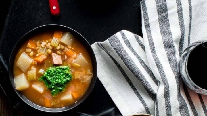 This Slow Cooker Ham Barley Soup with Spinach Pesto is the perfect weeknight vegetable packed delicious dinner. |Healthy Seasonal Recipes | Katie Webster #slowcooker #soup #weeknightdinner #pesto