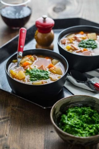 This Slow Cooker Ham Barley Soup with Spinach Pesto is the perfect weeknight vegetable packed delicious dinner. |Healthy Seasonal Recipes | Katie Webster #slowcooker #soup #weeknightdinner #pesto
