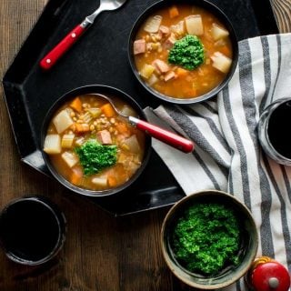 This Slow Cooker Ham Barley Soup with Spinach Pesto is the perfect weeknight vegetable packed delicious dinner. |Healthy Seasonal Recipes | Katie Webster #slowcooker #soup #weeknightdinner #pesto