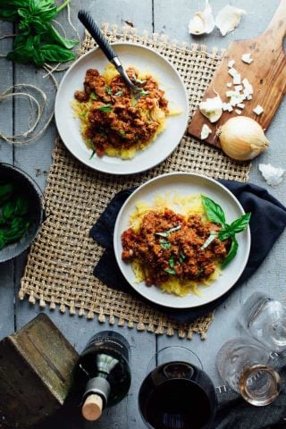 Check out this awesome Spaghetti Squash with Turkey Sausage Ragu. It is ready in just 50 minutes and is gluten free, wheat free and dairy free. | Healthy Seasonal Recipes | Katie Webster