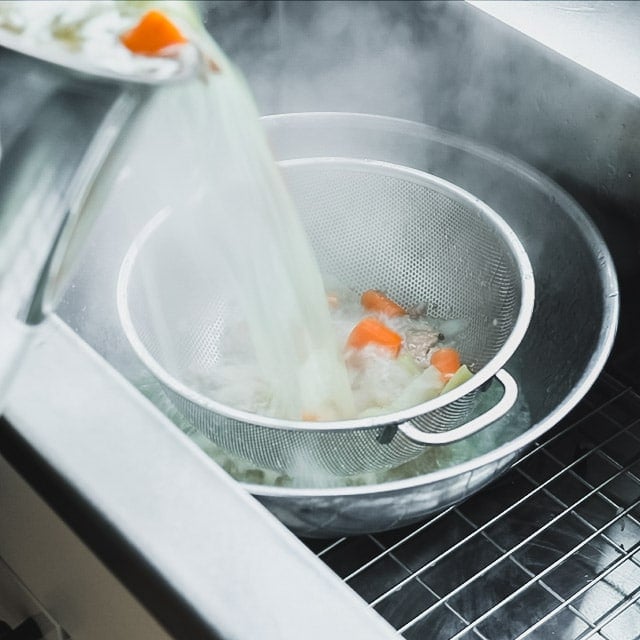 Strain the stock and chill it.