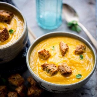 Healthy Vegan Carrot Ginger Soup with Oregano Croutons on healthyseasonalrecipes.com by Katie Webster