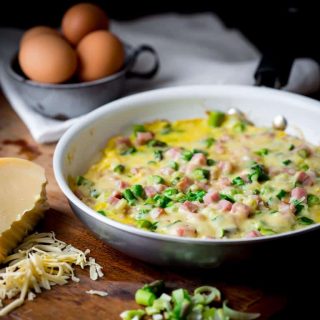 Ham Asparagus Frittata with shredded Gouda. This is a super fast weeknight dinner, or serve for Easter brunch! Primal friendly and gluten-free | Healthy Seasonal Recipes @healthyseasonal