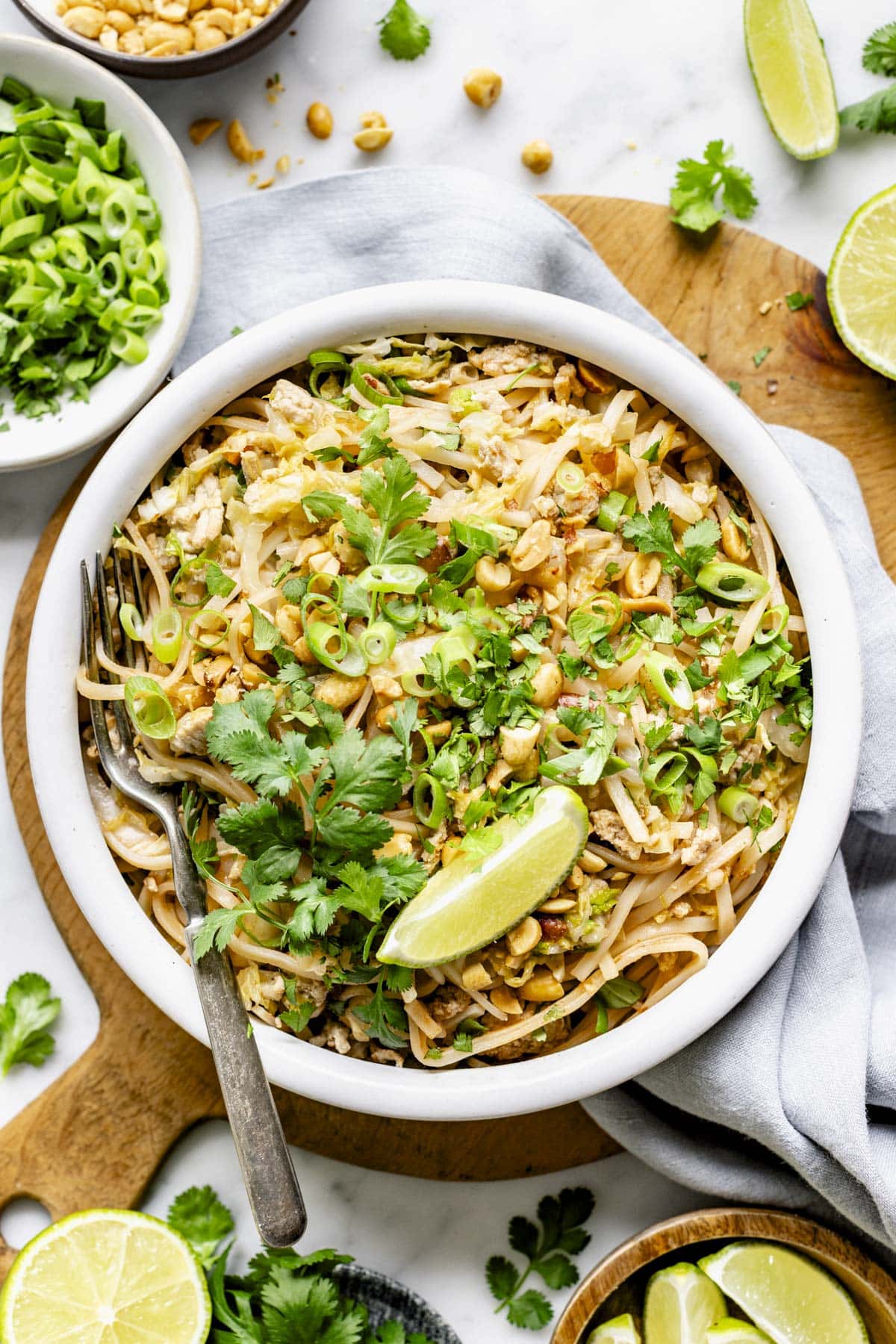 a serving of the Pad Thai with turkey with fresh chopped herbs on top and lime wedge