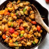 the skillet with the panzanella in it up close