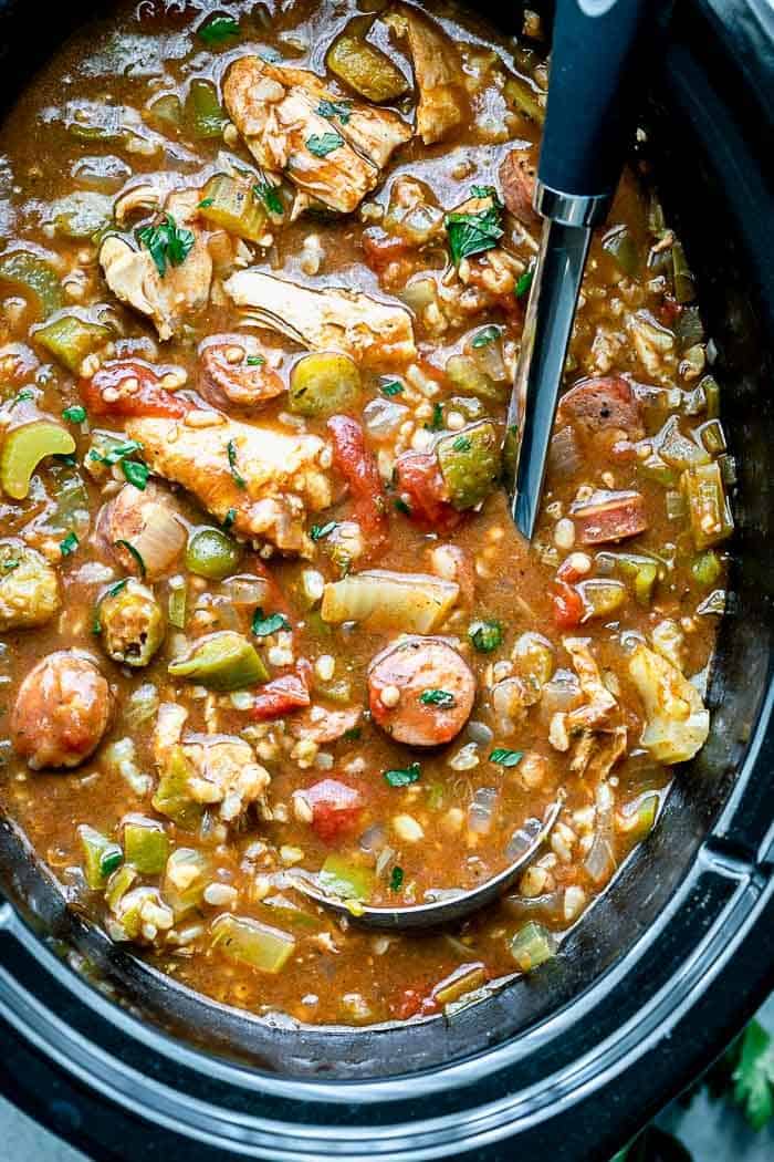 a close up into the slow cooker filled with gumbo