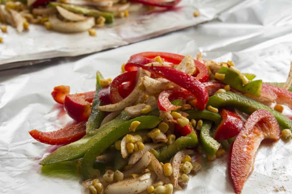 the fajita veggies on foil before grilling