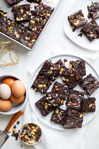 These Fudgy Greek Yogurt Trail Mix Brownies are the perfect treat to take to your next Spring event! Healthy Seasonal Recipes #brownie #vegetarian #dessert #chocolate #kidfriendly