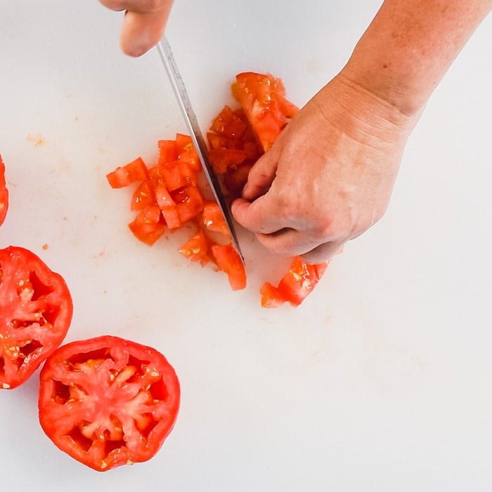 Dice the tomatoes