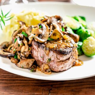 the plates steak with brussels sprouts and mashed potatoes