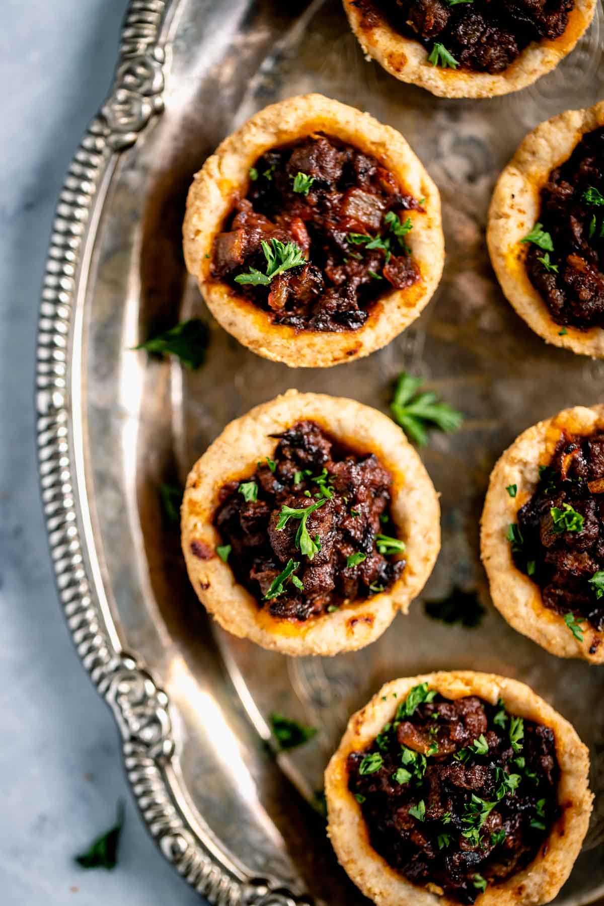 overhead of the appetizers on a silver tray