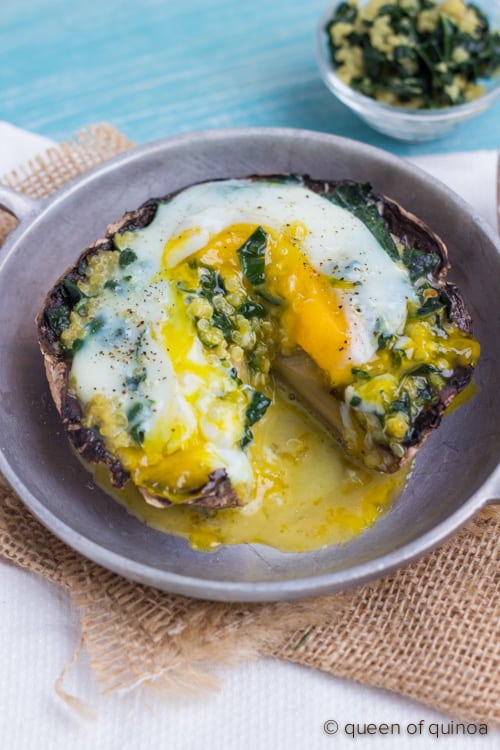 quinoa stuffed portobello mushroom with an egg on top on a plate