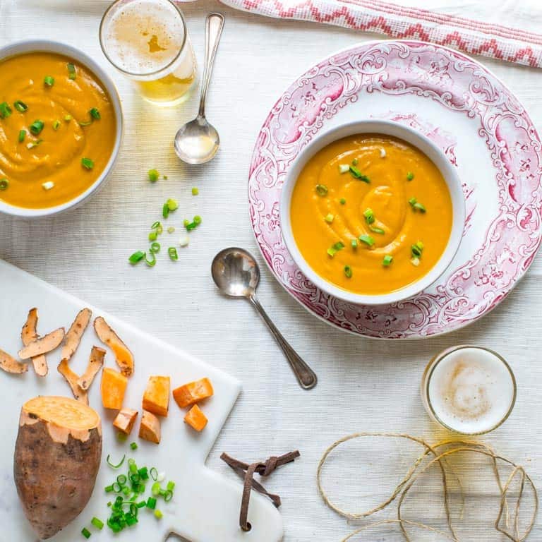 This Cheddar Chipotle Sweet Potato Soup Creamy is smooth baby! It gets a smoky kick from chipotle and a tangy burst from sharp cheddar making it an awesome vegetarian fall meal. Gluten free and grain free, too! | Healthy Seasonal Recipes | Katie Webster