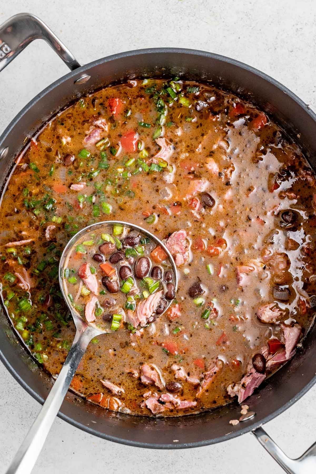 the soup after the ham is stirred back into it