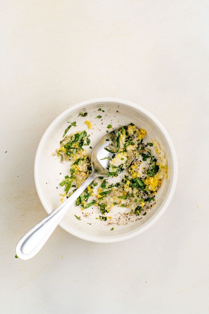herb, garlic and lemon paste in a white bowl