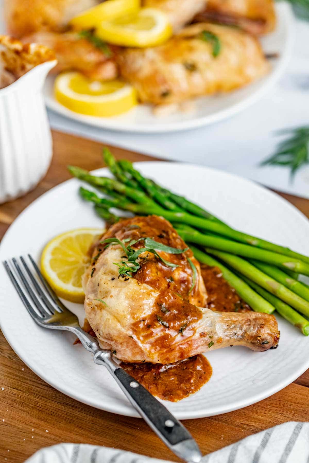 chicken leg with gravy with asparagus