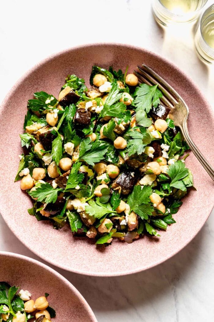 overhead of eggplant salad in a pink bowl