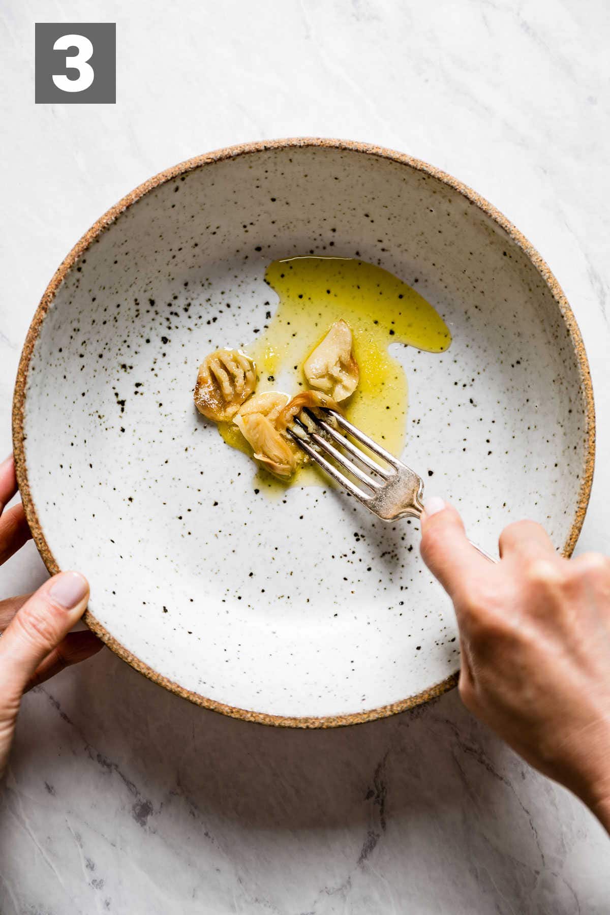 mash the garlic in a bowl