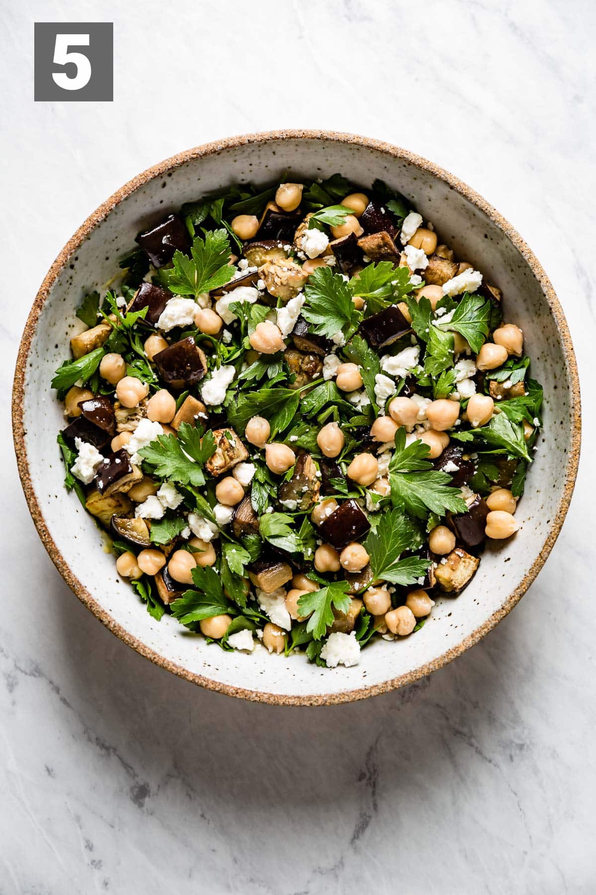 mix the eggplant, parsley, and chickpeas into the dressing