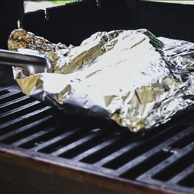 turning the packets with tongs.
