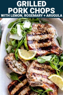 a platter of pork chops with the arugula salad