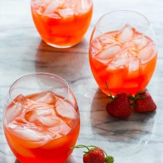 Strawberry-Ginger Pink Lemonade Cocktails on healthyseasonalrecipes.com