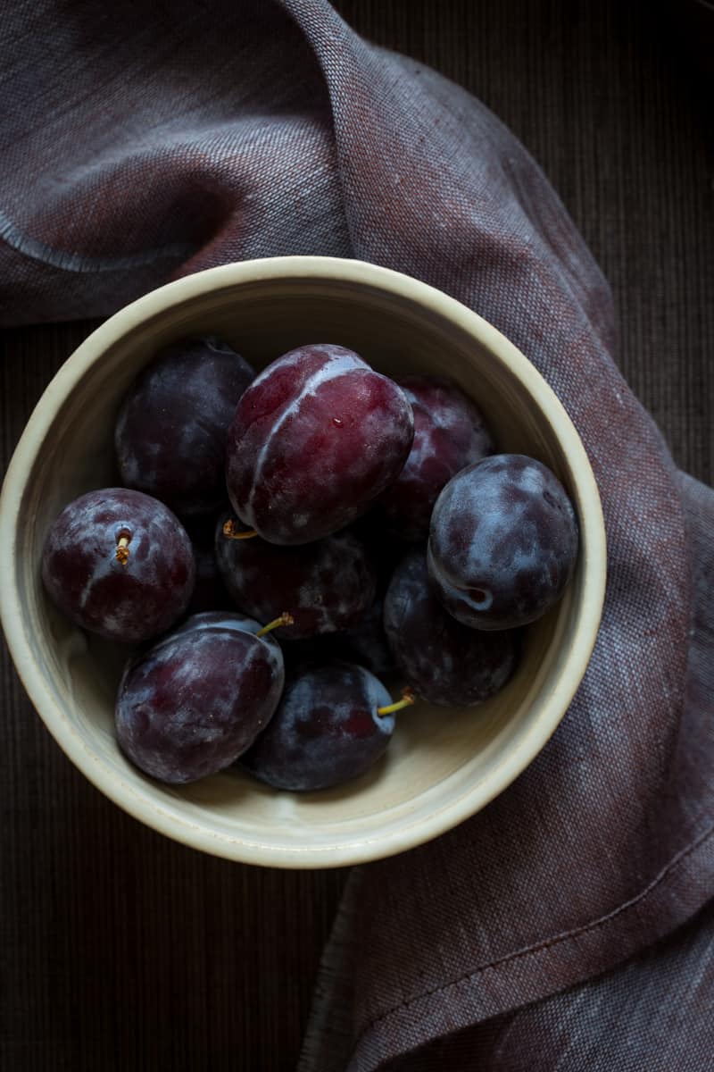 italian prune plums in a bowl