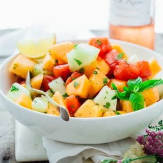 The 4 ingredient Melon and Mint Salad recipe I have for you today is utterly delicious in its simplicity. It takes just 10 minutes and is totally gluten free and dairy free! | Healthy Seasonal Recipes | Katie Webster