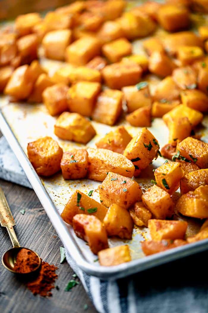 a sheet pan with roasted squash
