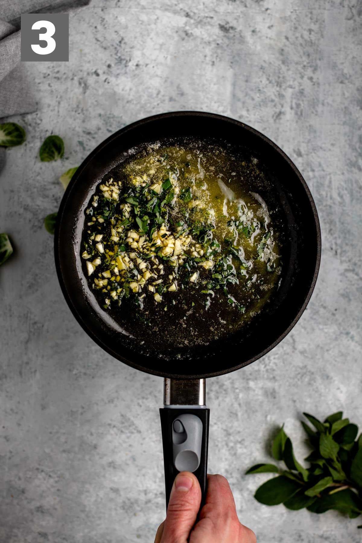 cook the garlic in the butter and oil, then stir in the sage