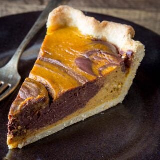 a slice of chocolate swirl pumpkin pie