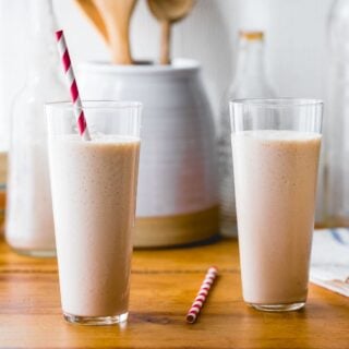 fruit kombucha smoothie in two tall glasses