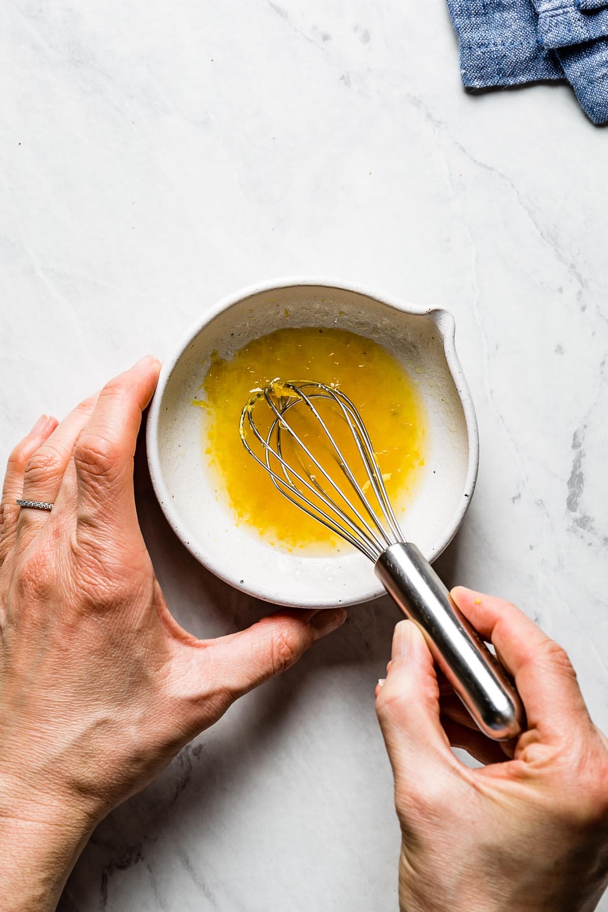 whisking lemon mixture