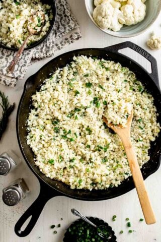 a skillet from overhead filled with cauliflower rice