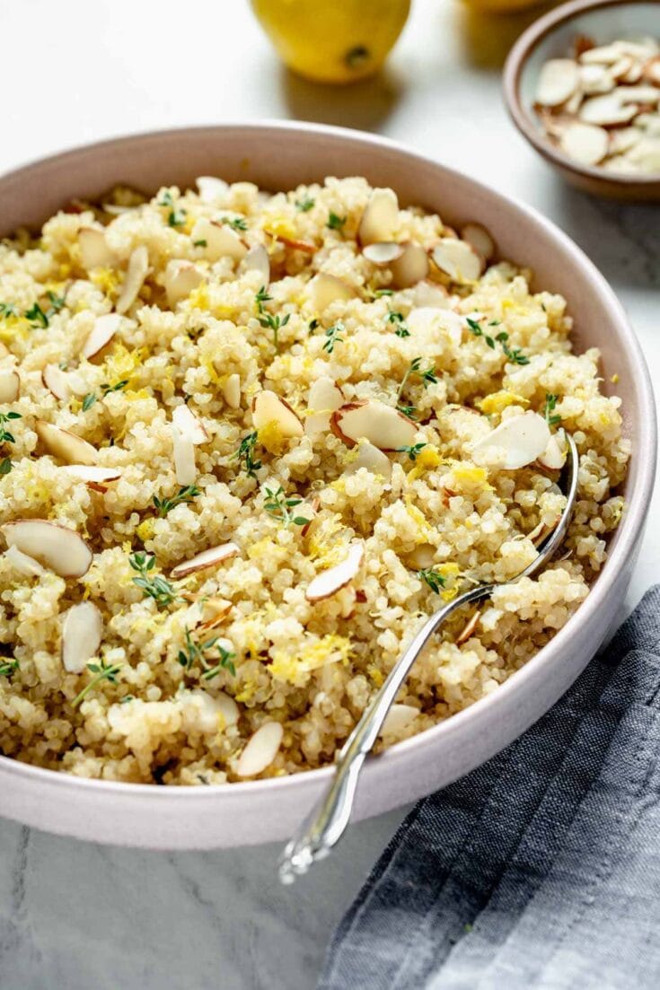 lemon quinoa with almonds and thyme from the side close up