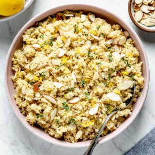 overhead view into pink bowl filled with quinoa