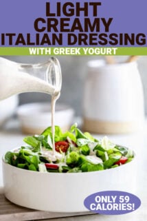 italian salad dressing in a jar being poured into a white bowl filled with leafy green salad with a text box at the top saying 'light creamy italian dressing with greek yogurt'