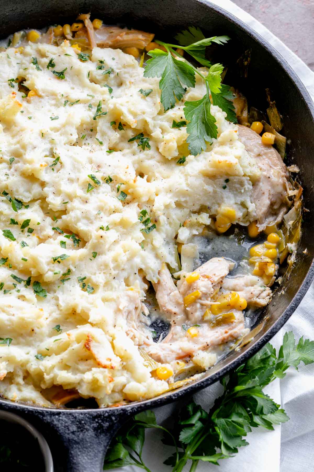 chicken shepherd's pie in cast iron skillet.