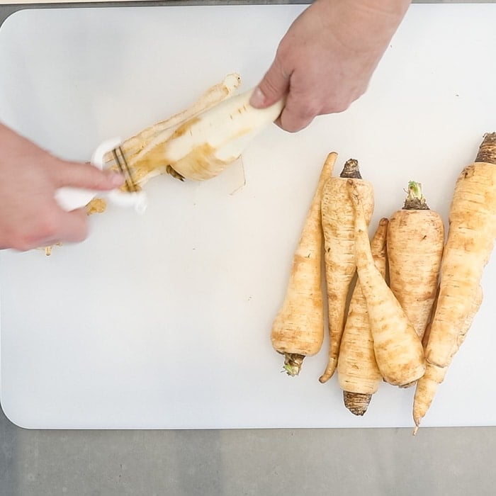 Peel the carrots before cutting
